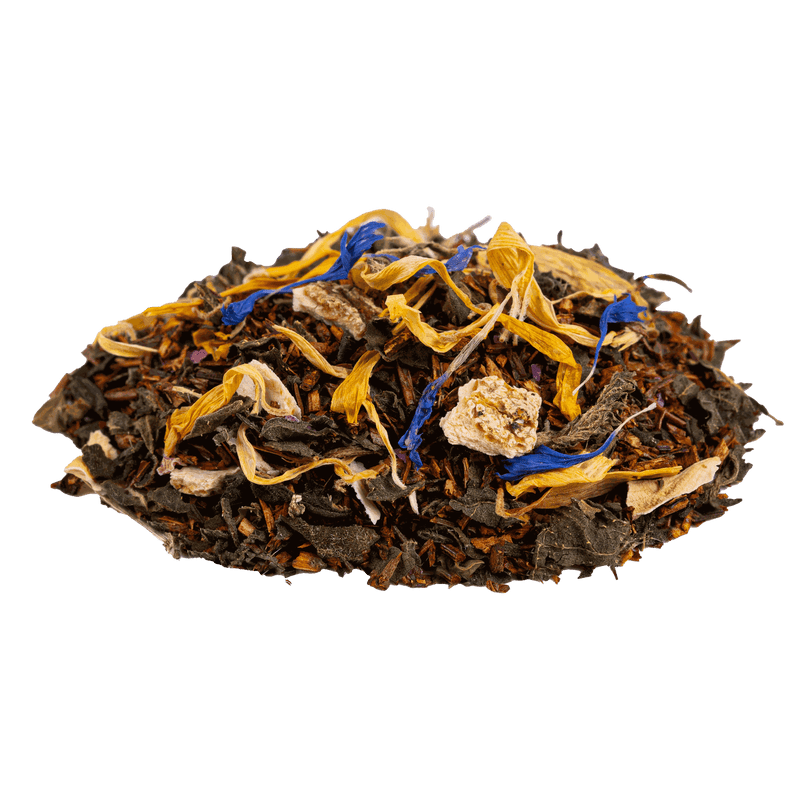 Aurinkoinen päiväuni luomu rooibos. Sivukuvassa Aurinkoinen päiväuni luomu rooibos, jossa nokkosta, appelsiininkuoria, aroniaa, kehäkukkia, ruusun terälehtiä, mangoa ja ruiskaunokkeja.