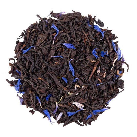 Blue Earl Grey luomu musta tee maustettu. Kuvassa Blue Earl Grey luomu mustan teen teelehtiä sekä ruiskaunokkeja.